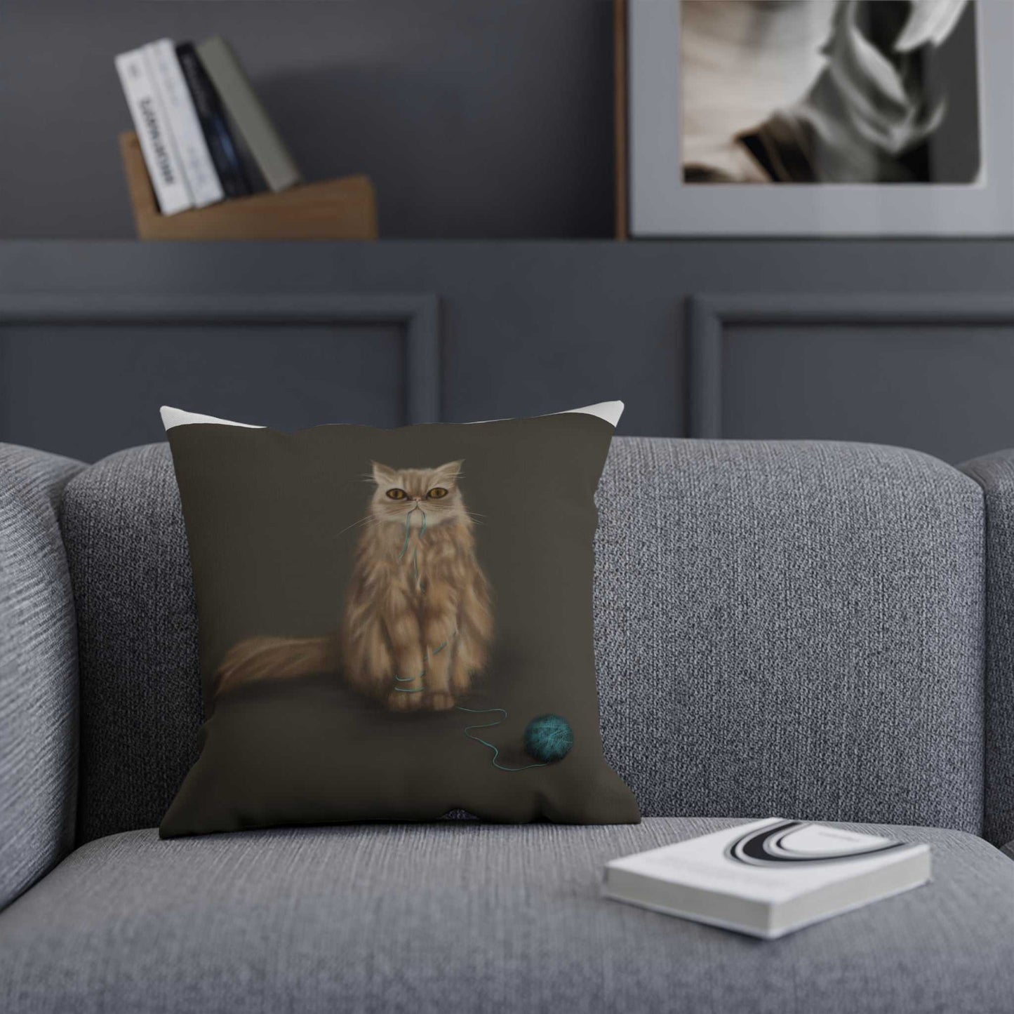 Cushion "SHUGA" with custom character design, 100% cotton drill cover, polyester filling, double-sided print, on a couch.