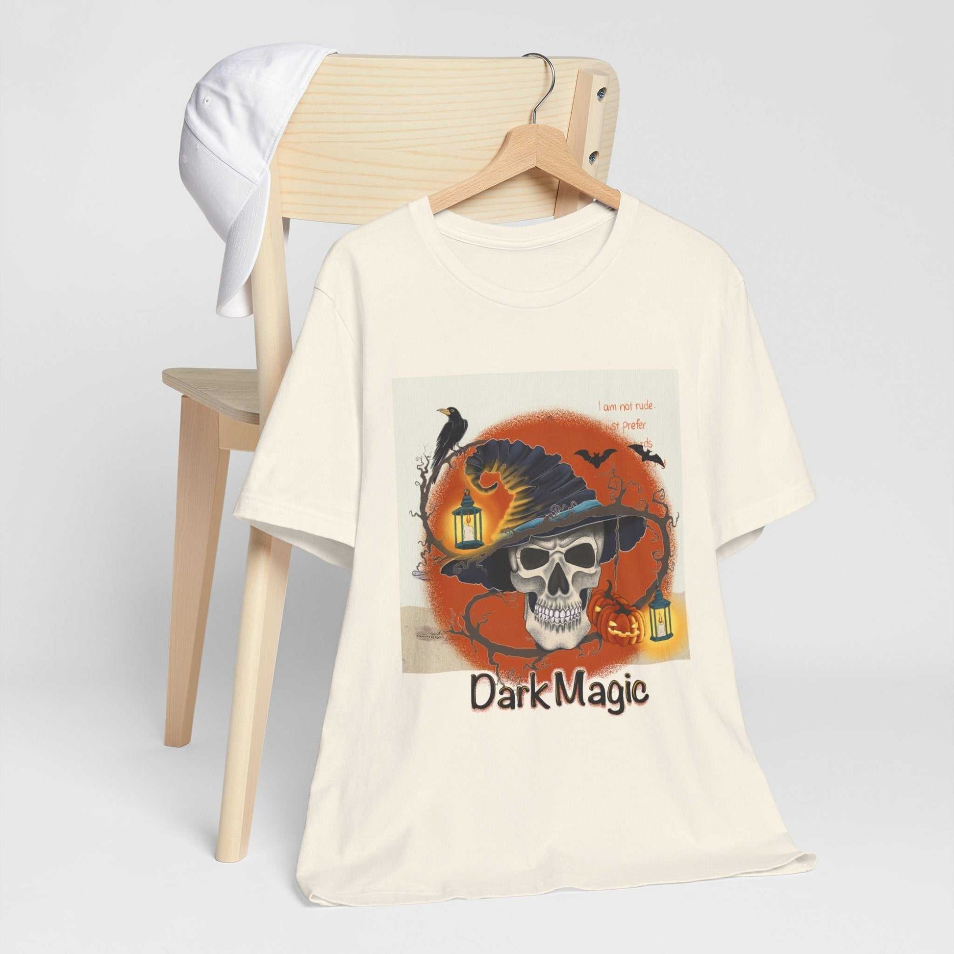 Unisex jersey short sleeve tee with Dark Magic design, displayed on hanger.