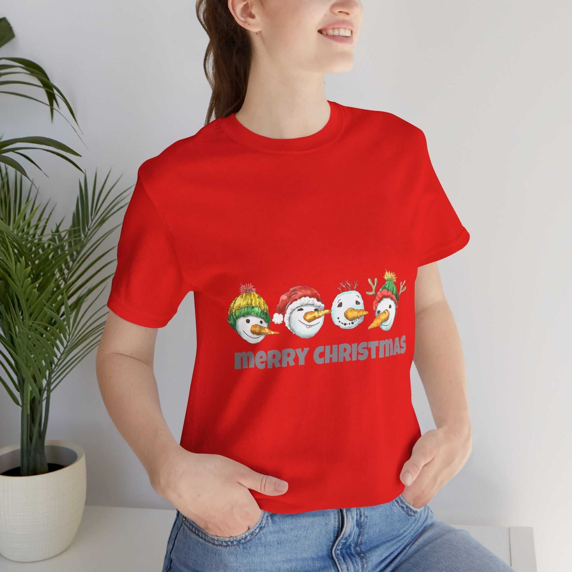 Red Christmas t-shirt with snowman design, perfect holiday gift for men and women.